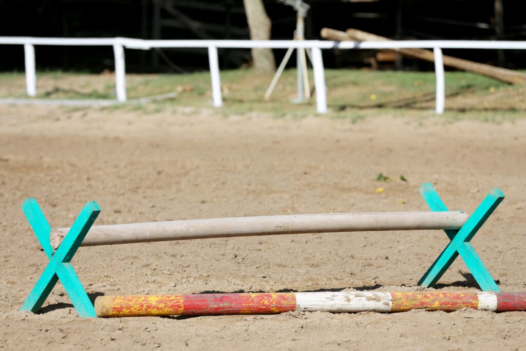 a traditional wooden cavaletti in an arena